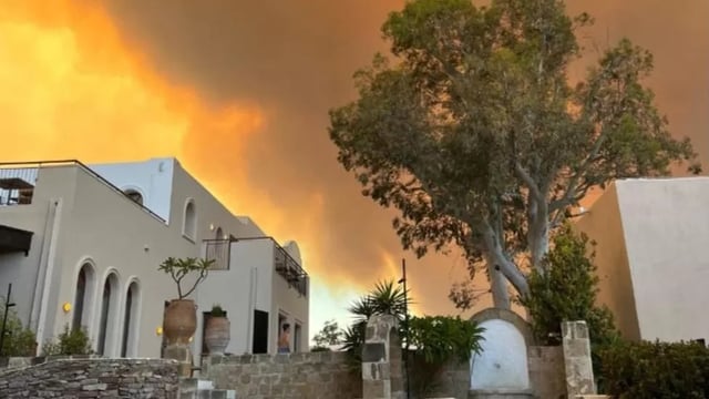 Thousands moved to safety as wildfires rage on Greek island of Rhodes