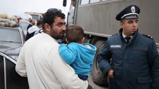 Thousands flee enclave as Azerbaijan, Armenia envoys to meet